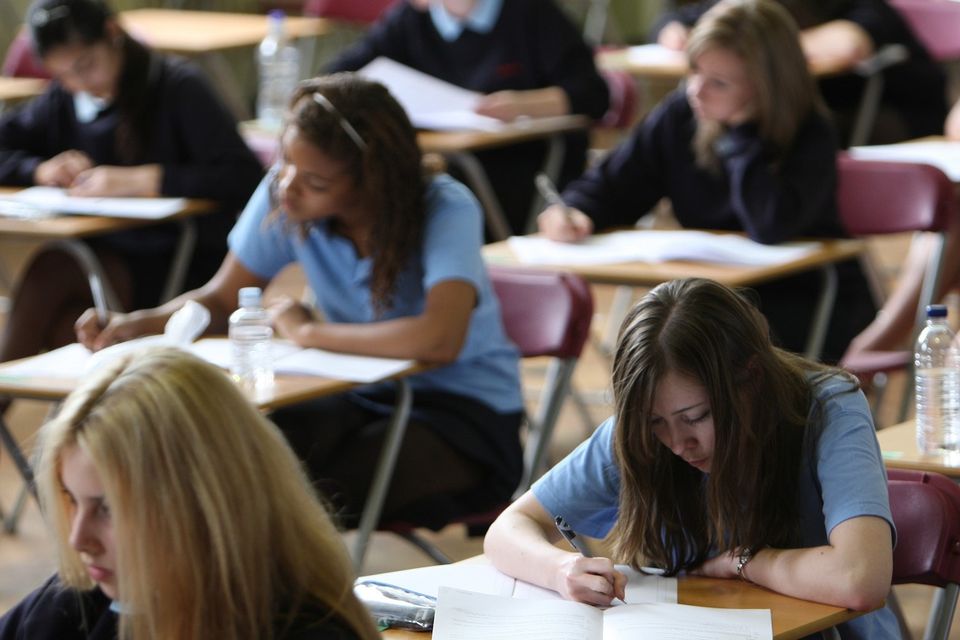Pupils taking a GCSE English exam at Colchester County High School for Girls