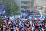 thumbnail: Ipswich Town players during an open-top bus parade in Ipswich to celebrate promotion to the Premier League. Pic: Chris Radburn