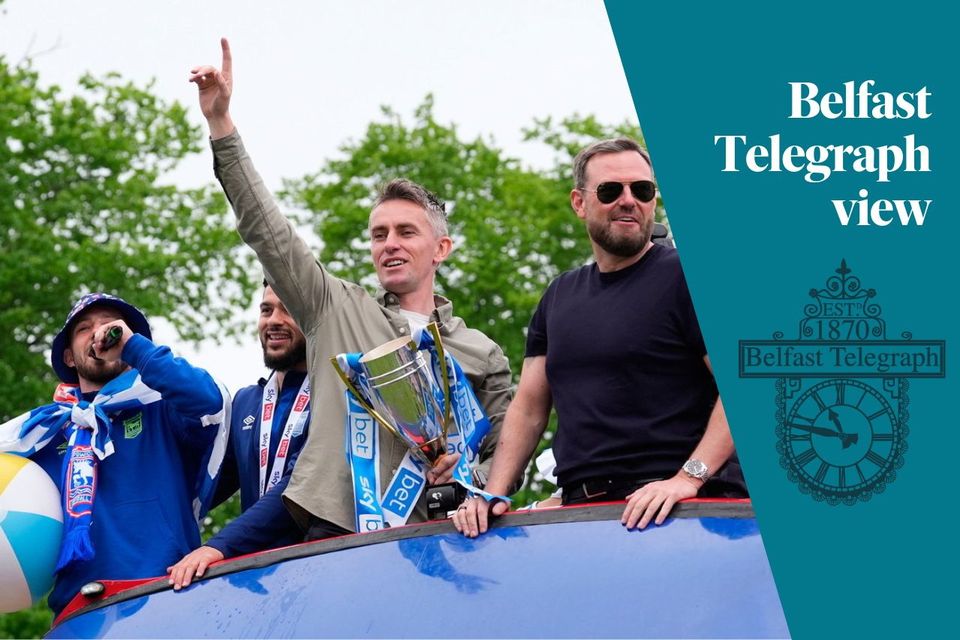 Ipswich Town manager Kieran McKenna during an open-top bus parade in the Suffolk town to celebrate promotion to the Premier League