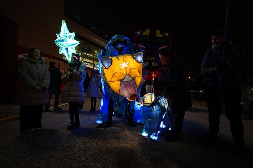 The lantern parade started at Everton FC’s Goodison Park stadium (Peter Byrne/PA)