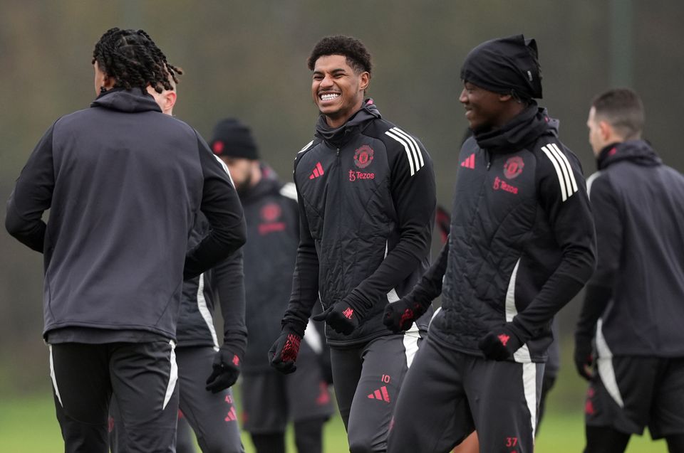 Marcus Rashford, centre, was seen training with his Manchester United team-mates on Wednesday but has not played since December 12 (Martin Rickett/PA)