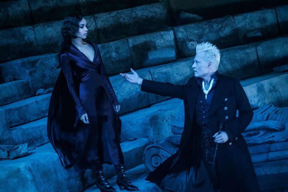 Zoe Kravitz as Leta Lestrange and Johnny Depp as Gellert Grindelwald