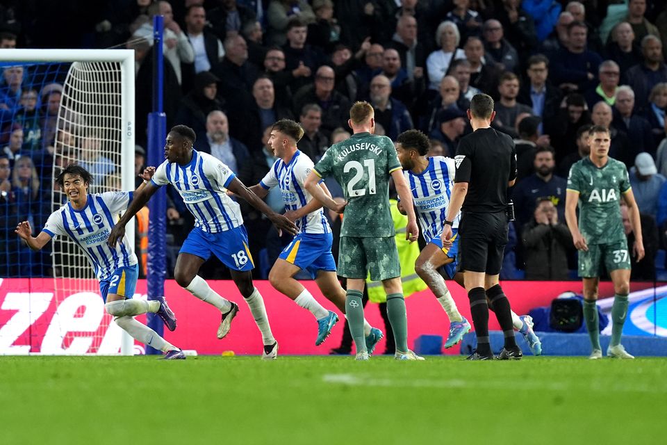 Danny Welbeck celebrates after scoring Brighton’s third goal against Spurs (Gareth Fuller/PA)