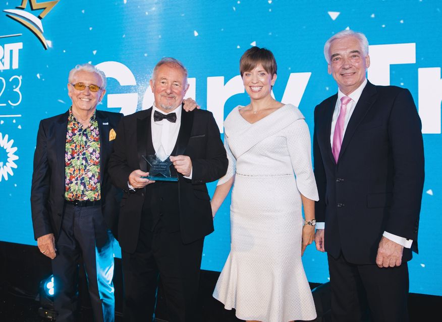 Caring Spirit winner Gary Trew with, from left, Tony Christie, Gwyneth Compston of Power NI and UTV's Paul Clark (Photo by Kevin Scott)