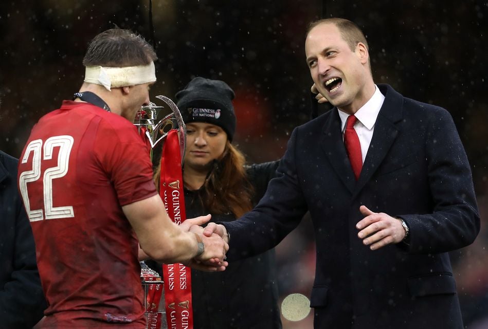 William with Wales’ Dan Biggar in 2019 during the presentation of the Six Nations trophy (David Davies/PA)