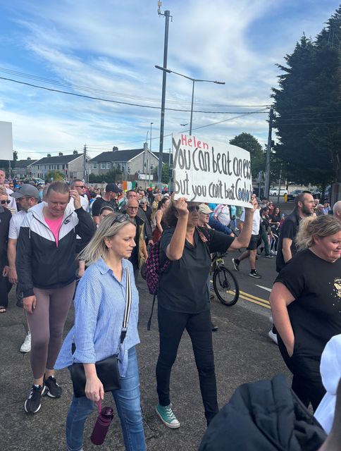 People take part in a demonstration in Coolock, north Dublin (Cate McCurry/PA)