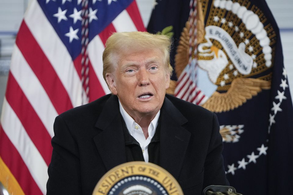 President Donald Trump is briefed on the effects of Hurricane Helene at Asheville Regional Airport (Mark Schiefelbein/AP)