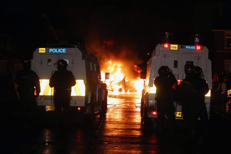 A car burns in the Castlereagh Street of east Belfast