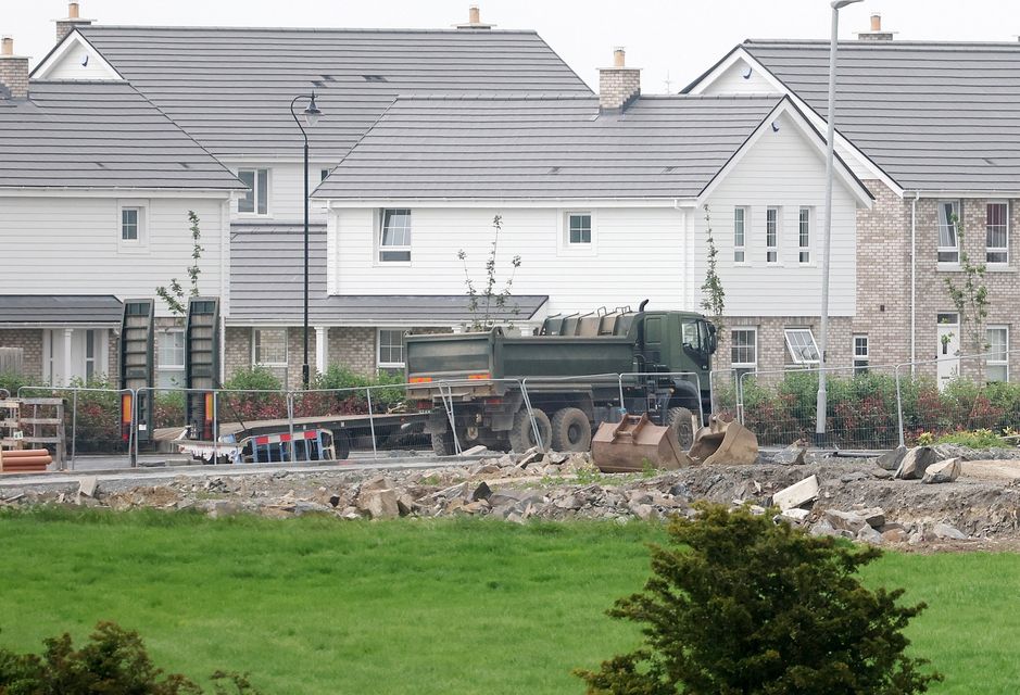 Army and police deal with a suspected World War Two bomb which was discovered on a building site in the the Rivenwood housing development area of Newtownards, Co. Down. Pic by Jonathan Porter/Press Eye.