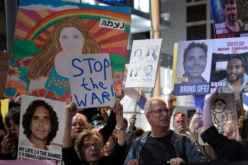 Supporters of Israelis held hostage by Hamas in the Gaza Strip protest in Tel Aviv (Maya Alleruzzo/AP)