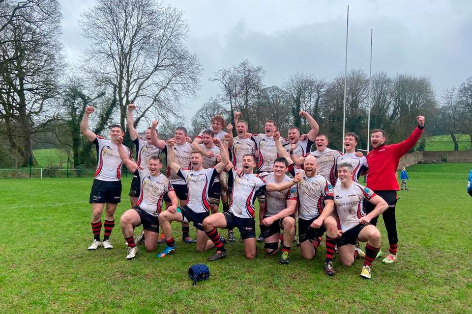 Armagh celebrate promotion after their win over UCC