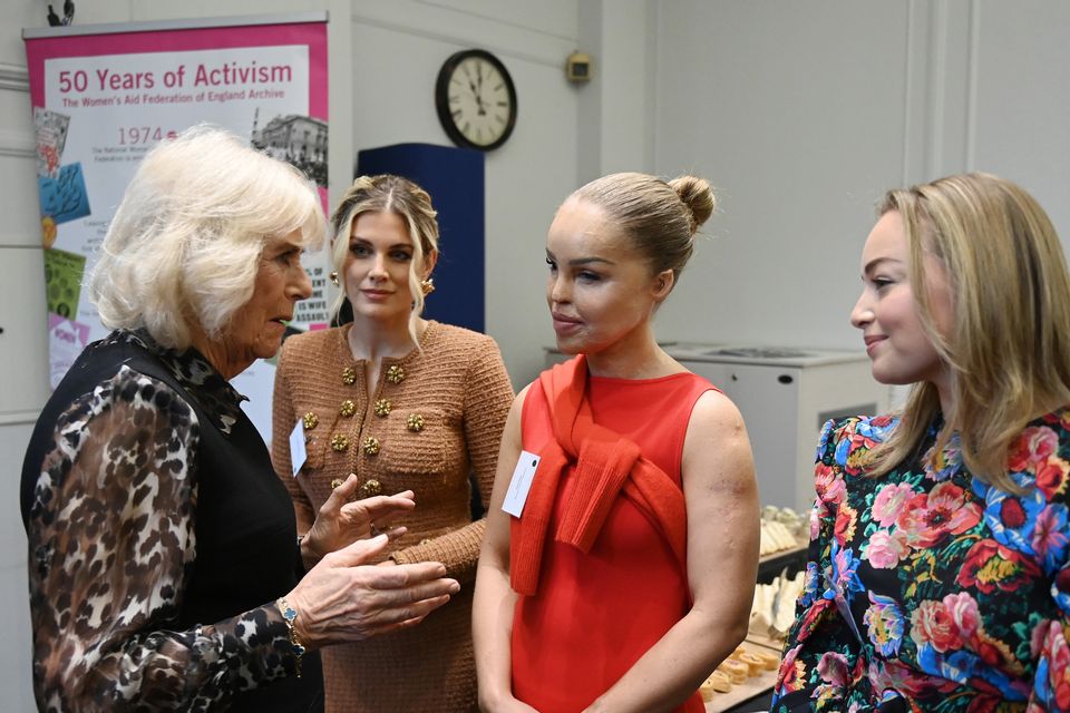 Camilla speaks to (left to right) Ashley James, Katie Piper and Alice Liveing (Stuart C. Wilson/PA)