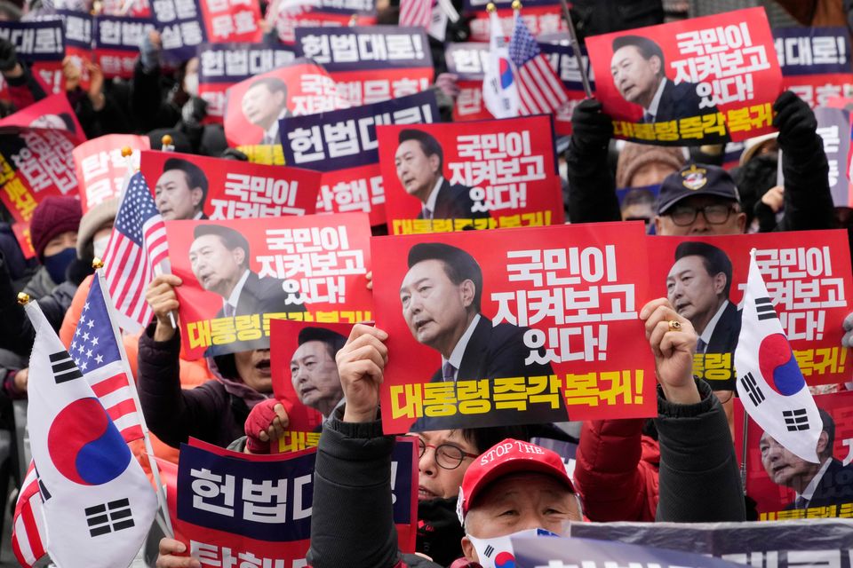 Supporters of impeached South Korean President Yoon Suk Yeol stage a rally to oppose his impeachment near the Constitutional Court in Seoul, South Korea, on Tuesday (Ahn Young-joon/AP)