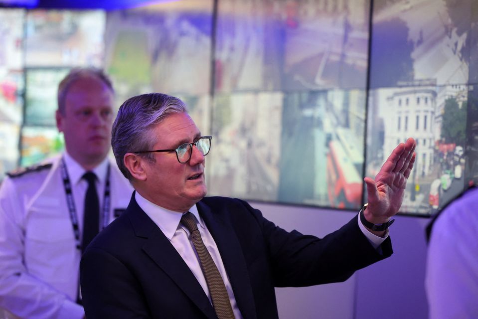 Prime Minister Keir Starmer views CCTV screens in the Engineering Suite in the Metropolitan Police Command and Control Special Operations Room during his visit to Lambeth Police Headquarters in London (Toby Melville/PA)