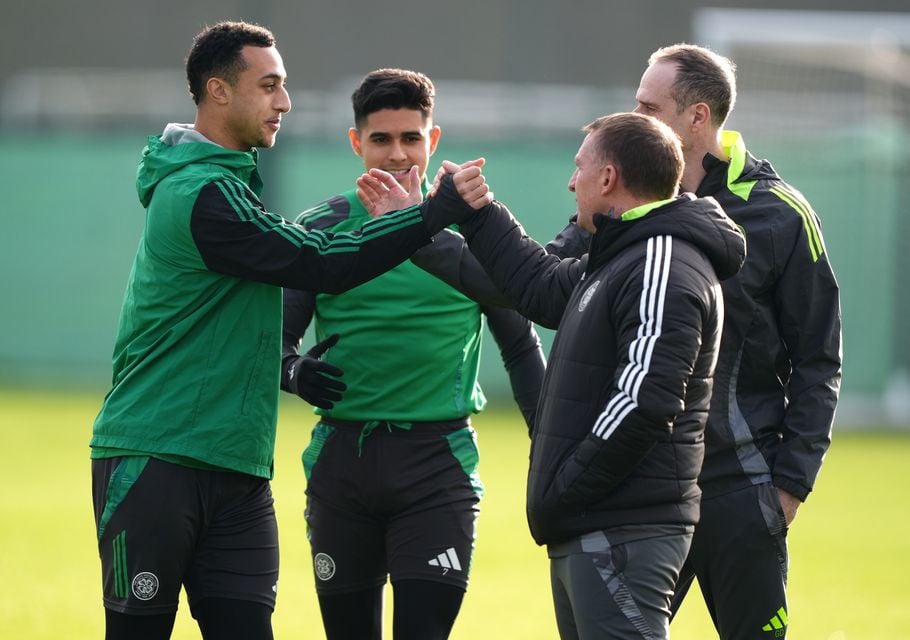 Adam Idah and Luis Palma are greeted by Rodgers during a training session (Andrew Milligan/PA)