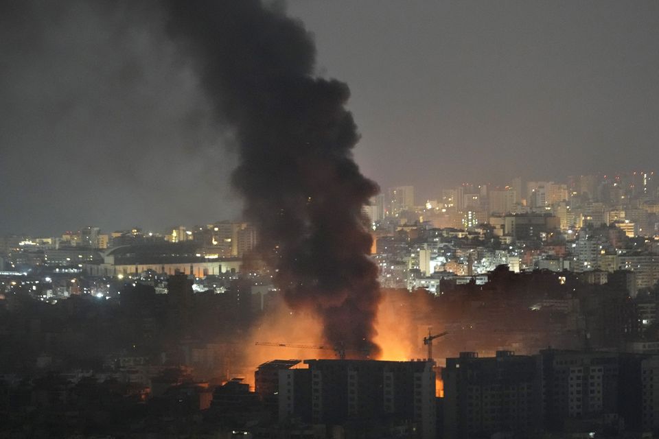 Flame and smoke rise from Israeli airstrikes on Dahiyeh, in the southern suburb of Beirut (Hussein Malla/AP)