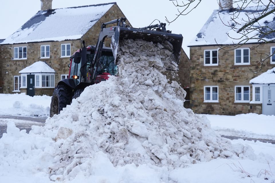 Snow is cleared in Catton, Northumberland (Owen Humphreys/PA)