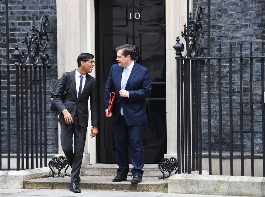 Rishi Sunak and Robert Jenrick leaving No 10 after a meeting of Boris Johnson’s Cabinet (Victoria Jones/PA)