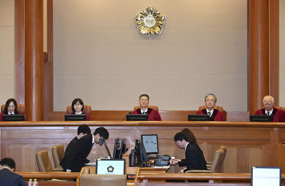 South Korea’s Constitutional Court sits for the first formal hearing of a trial on the validity of President Yoon Suk Yeol’s impeachment (Kim Min-Hee/Pool/AP)