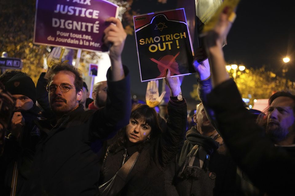 Protesters rally against the gala (Ahristophe Ena/AP)