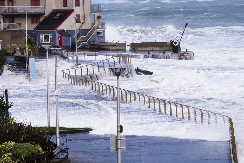 Waves cover the promenade at the Arcadia in Portrush.