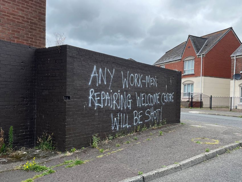 A view of menacing graffiti in west Belfast (David Young/PA)