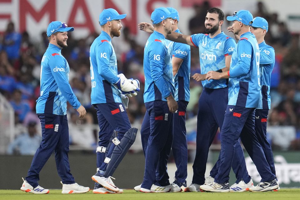 Saqib Mahmood, third right, insists England are focused on the final two ODIs (Aijaz Rahi/AP)