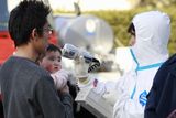 thumbnail: A man holds his baby as they are scanned for levels of radiation in Koriyama, Fukushima Prefecture, Japan, Sunday, March 13, 2011. Friday's quake and tsunami damaged two nuclear reactors at a power plant in the prefecture, and at least one of them appeared to be going through a partial meltdown, raising fears of a radiation leak. (AP Photo/Mark Baker)