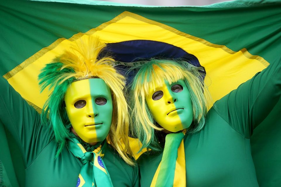 Fans arrive before the Group A match between Brazil and Cameroon at Estadio Nacional on June 23, 2014 in Brasilia, Brazil. (Photo by Celso Junior/Getty Images)