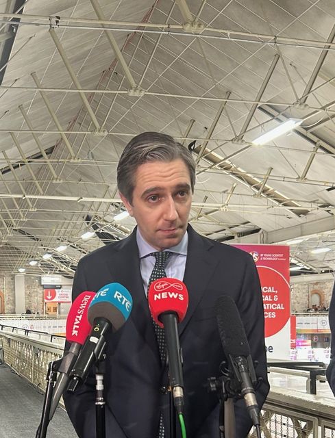 Taoiseach and Fine Gael leader Simon Harris speaking to the media at the BT Young Scientist and Technology Exhibition at the RDS in Dublin (PA)