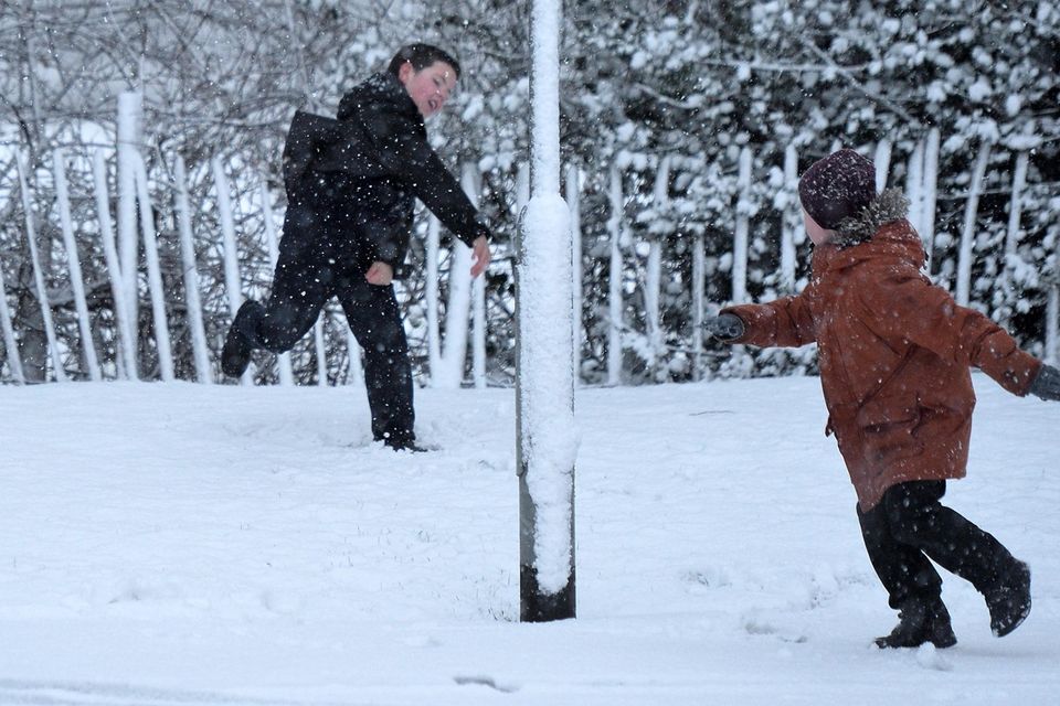 Pacemaker Press 08/12/2017
Young Boys play in the snow  in Crumlin , as heavy snow falls across  Northern Ireland on Friday morning, leaving difficult driving conditions for motorists and some schools closed.
Pic Colm Lenaghan/ Pacemaker