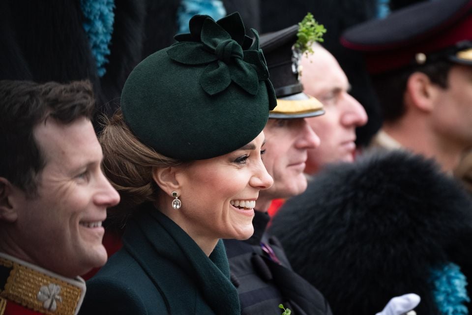 Kate poses for a photo during a visit to the Irish Guards (Aaron Chown/PA)