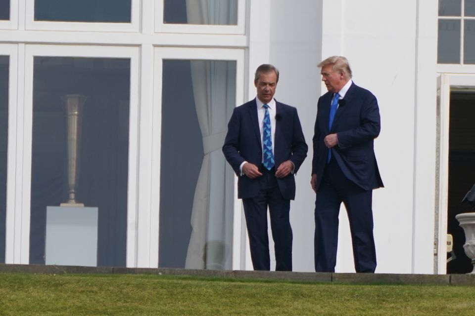 Donald Trump with Nigel Farage, now MP for Clacton and leader of Reform UK, at the Trump Turnberry course in South Ayrshire in May 2023 (Andrew Milligan/PA)