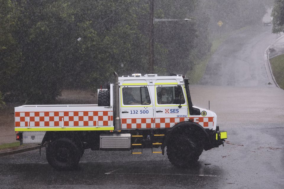 A State Emergency Services vehicle blocks a flooded road in Lismore in northern New South Wales (Jason O’Brien/AAP Image via AP)