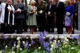 thumbnail: SLIGO, IRELAND - MAY 20:  (L-R) The Very Rev. Arfon Williams, Prince Charles, Prince of Wales and Camilla, Duchess of Cornwall, Former President of Ireland Mary McAleese, Martin McAleese, and Minister of Foreign Affairs Charlie Flanagan attend a tree planting ceremony after a service of peace and reconciliation at St. Columba's Church in Drumcliffe on the second day of a four day visit to Ireland on May 20, 2015 in Sligo, Ireland. The Prince of Wales and Duchess of Cornwall arrived in Ireland yesterday for their four day visit to the Republic and Northern Ireland, the visit has been described by the British Embassy as another important step in promoting peace and reconciliation.  (Photo by Brian Lawless - WPA Pool/Getty Images)