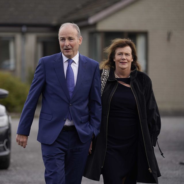 Tanaiste Micheal Martin and his wife Mary O’Shea arrive for the funeral (Niall Carson/PA)