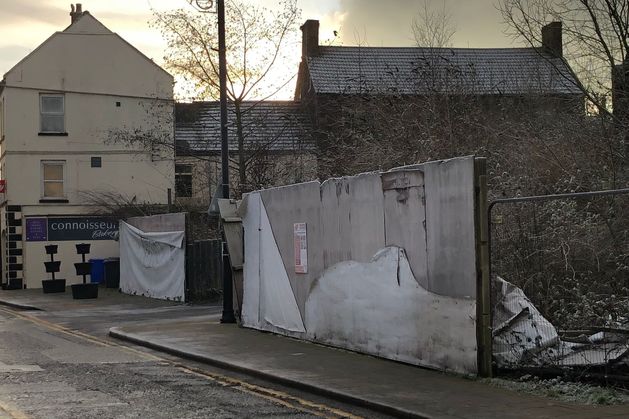 Residents of Co Down town in dispute with private landowner over ‘eyesore’ hoarding on main shopping street