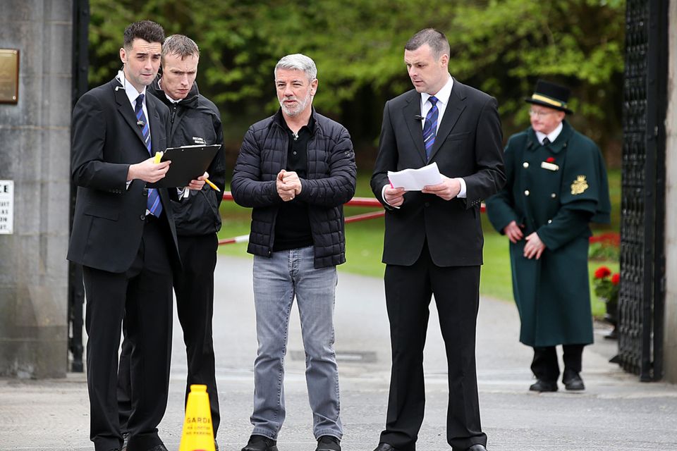 Brian Murphy who is Bono's personal bodyguard and also Rory McIlroy's (silver hair in centre) was among the tight security at the gates of Ashford Castle in Cong Co Mayo ahead of the Rory McIlroy wedding to Erica Stoll this weekend