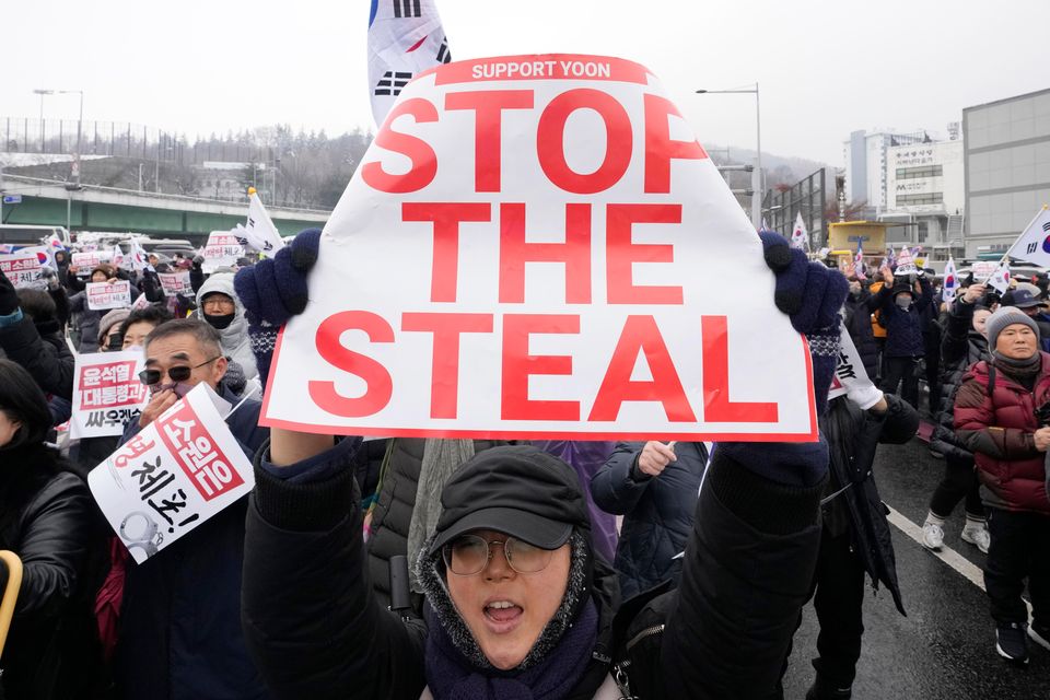 A supporter of impeached South Korean President Yoon Suk Yeol shouts slogans during a rally to oppose his impeachment near the presidential residence in Seoul (AP/Ahn Young-joon