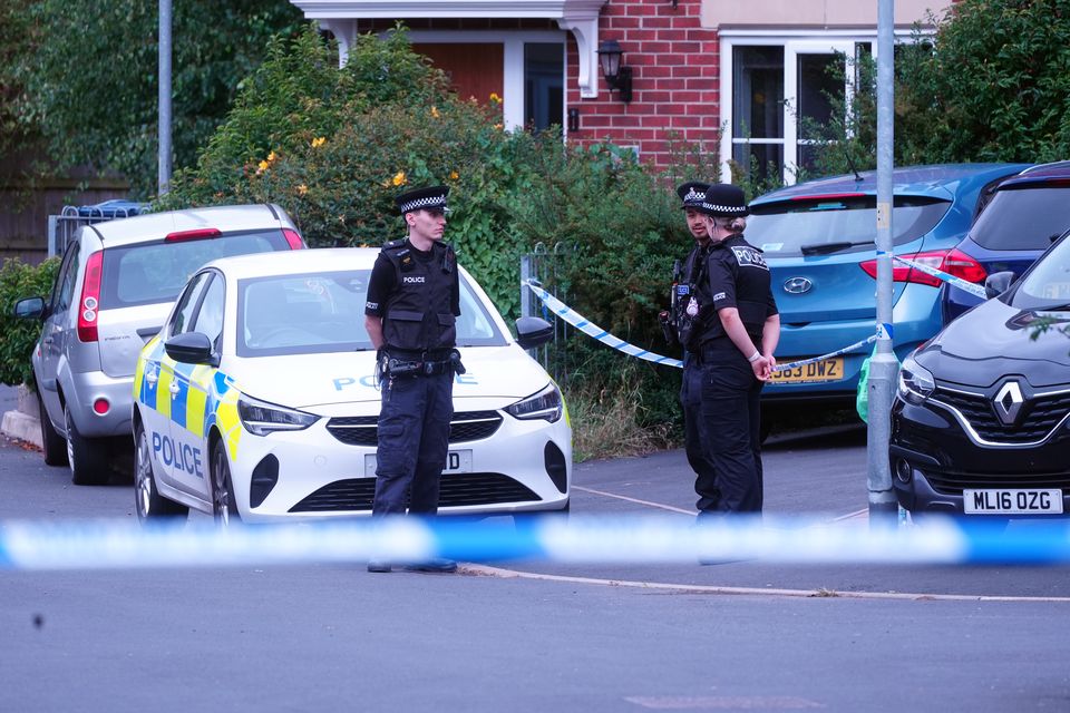 Police scene outside on Hart Street following the stabbings