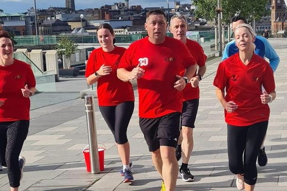 Seamus running with Colleen Brown, Enya Quigley, Stephen Quigley, Nicola Orr and Joe Coyle