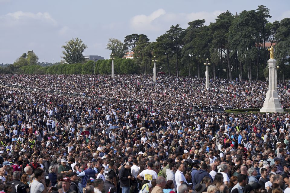 Tens of thousands of people gather at the Roman Catholic holy shrine of Fatima during the IX Pilgrimage of the Blessing of Helmets in Fatima, Portugal (Ana Brigida/AP)