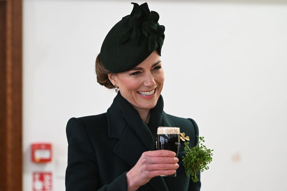 The princess enjoys a glass of Guinness during the visit (Eddie Mulholland/Daily Telegraph/PA)