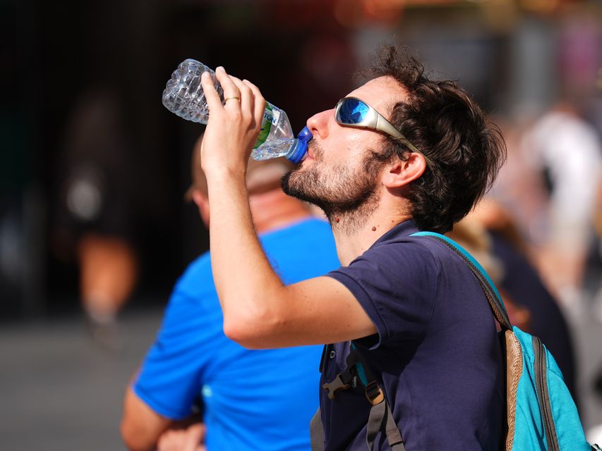 Staying hydrated is especially important during hot temperatures (James Manning/PA)