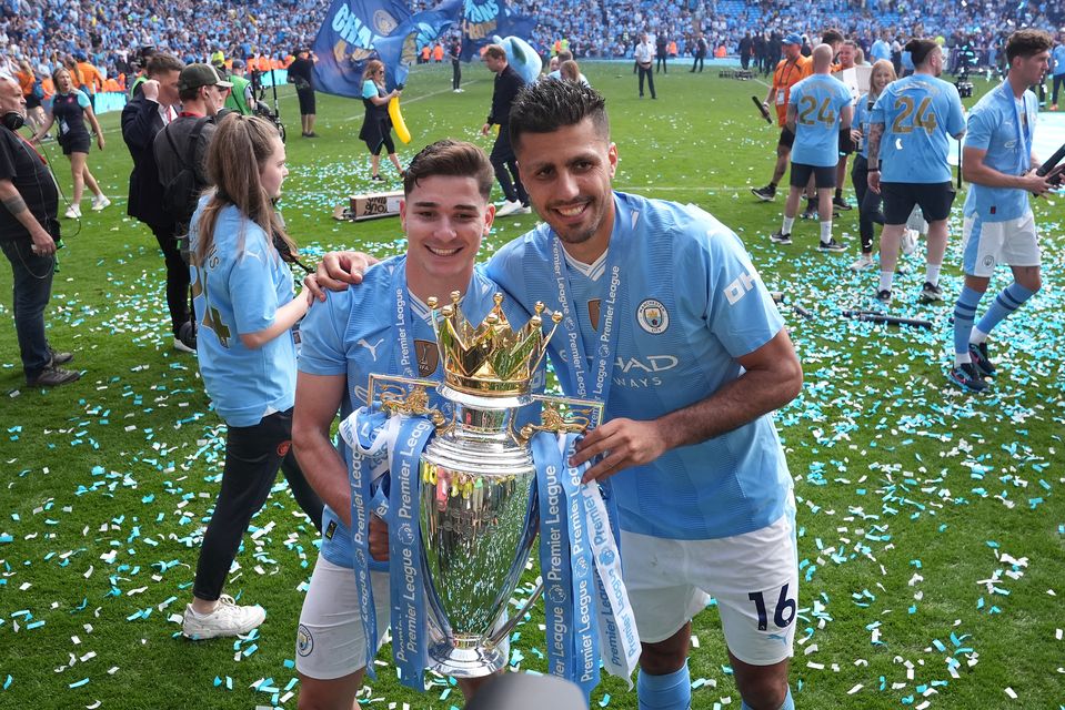 Julian Alvarez, left, is set to leave Manchester City and join Atletico Madrid (Martin Rickett/PA)