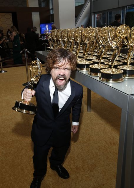 Peter Dinklage, winner of the award for outstanding supporting actor in a drama series for “Game of Thrones” (Photo by Eric Jamison/Invision for the Television Academy/AP Images).
