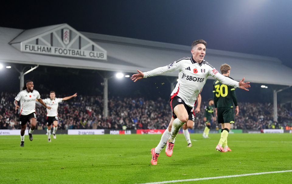 Fulham’s Harry Wilson celebrates the goal that completed the turnaround (PA)