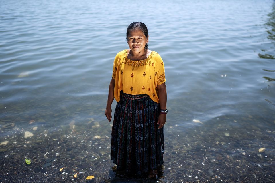 Sylvia Patricia Caal, 35, from Rubal Pec, stands in Lake Izabal (Brian Lawless/PA)