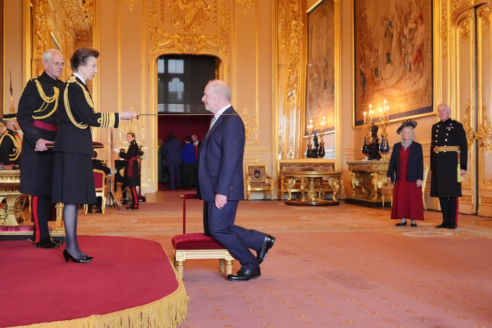 Sir Alan Bates was knighted by the Princess Royal at Windsor Castle (Jonathan Brady/PA)