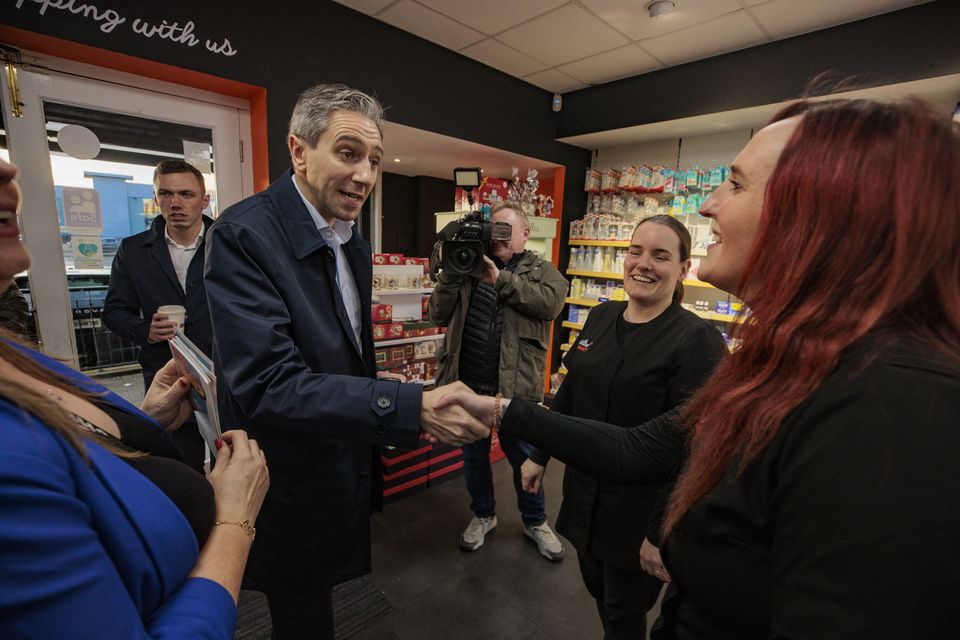 Simon Harris canvassing on a visit to Carrick-On-Shannon in Co Leitrim (Liam McBurney/PA)